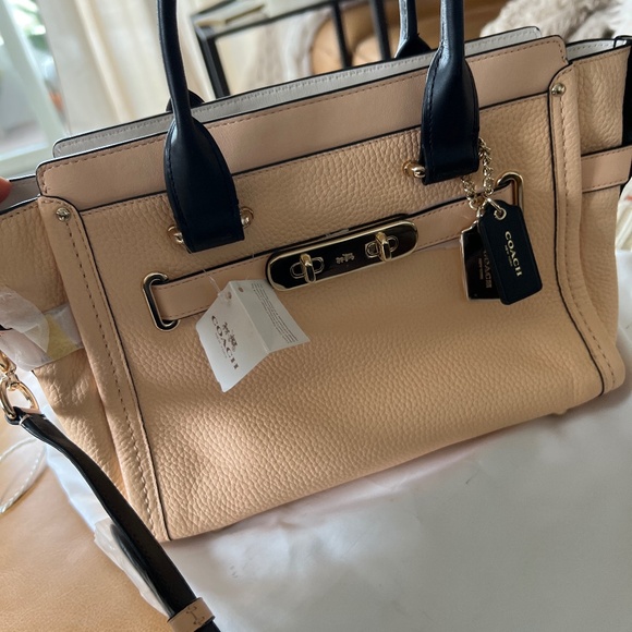 Coach small tote bag “Swagger 35” in color apricot - Picture 1 of 4